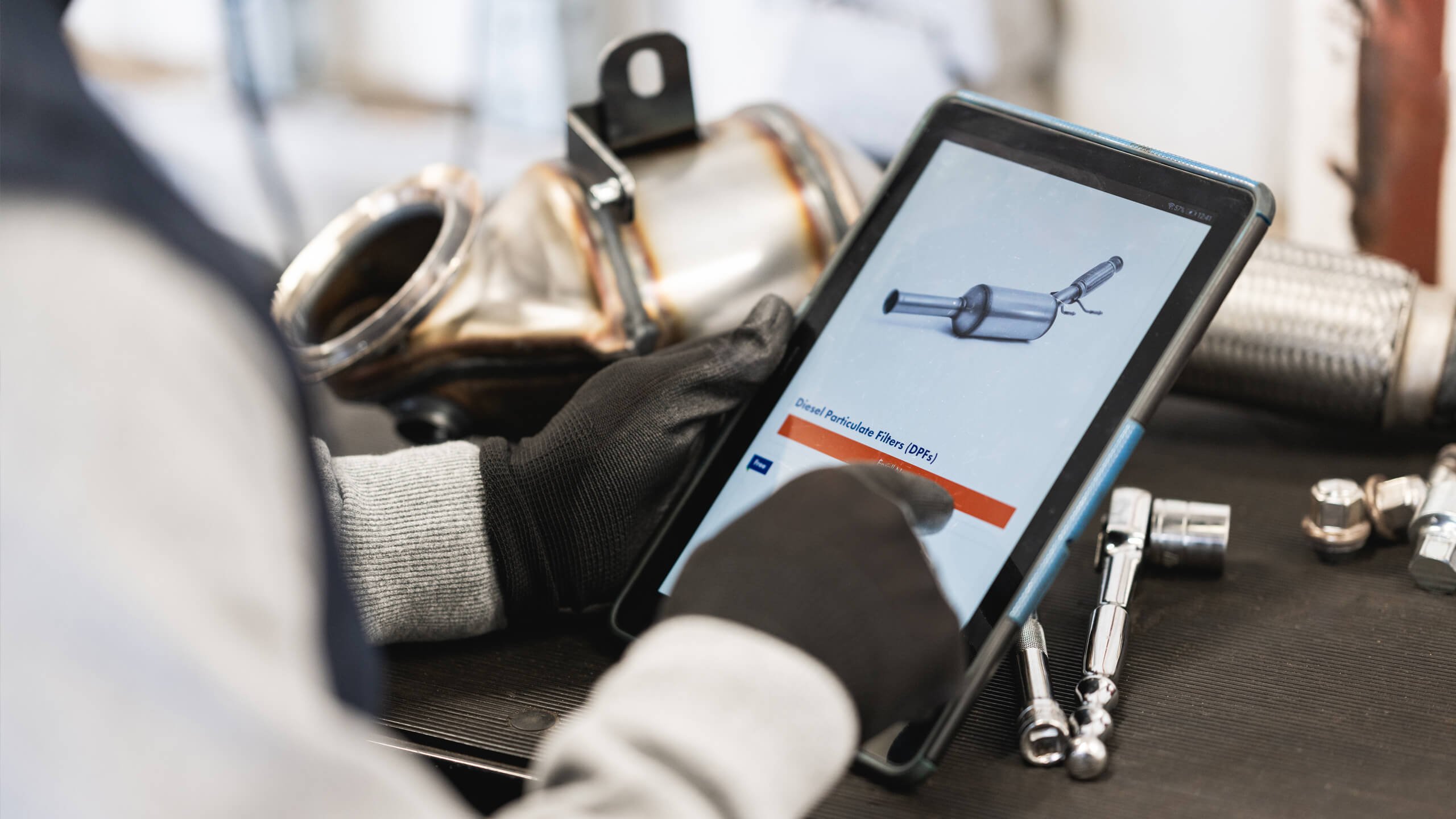 Person looking at part on an ipad