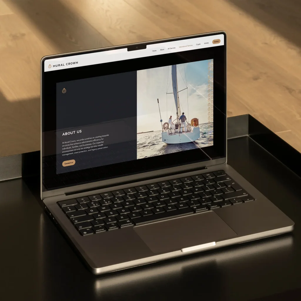 Gold laptop with About us screen.