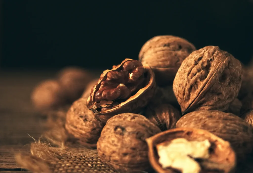 Walnuts in their shells.